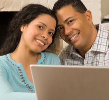 couple with laptop banner