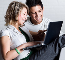 couple with laptop banner