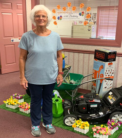 Woman standing in front of prizes