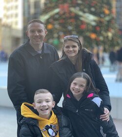 family posing for a picture